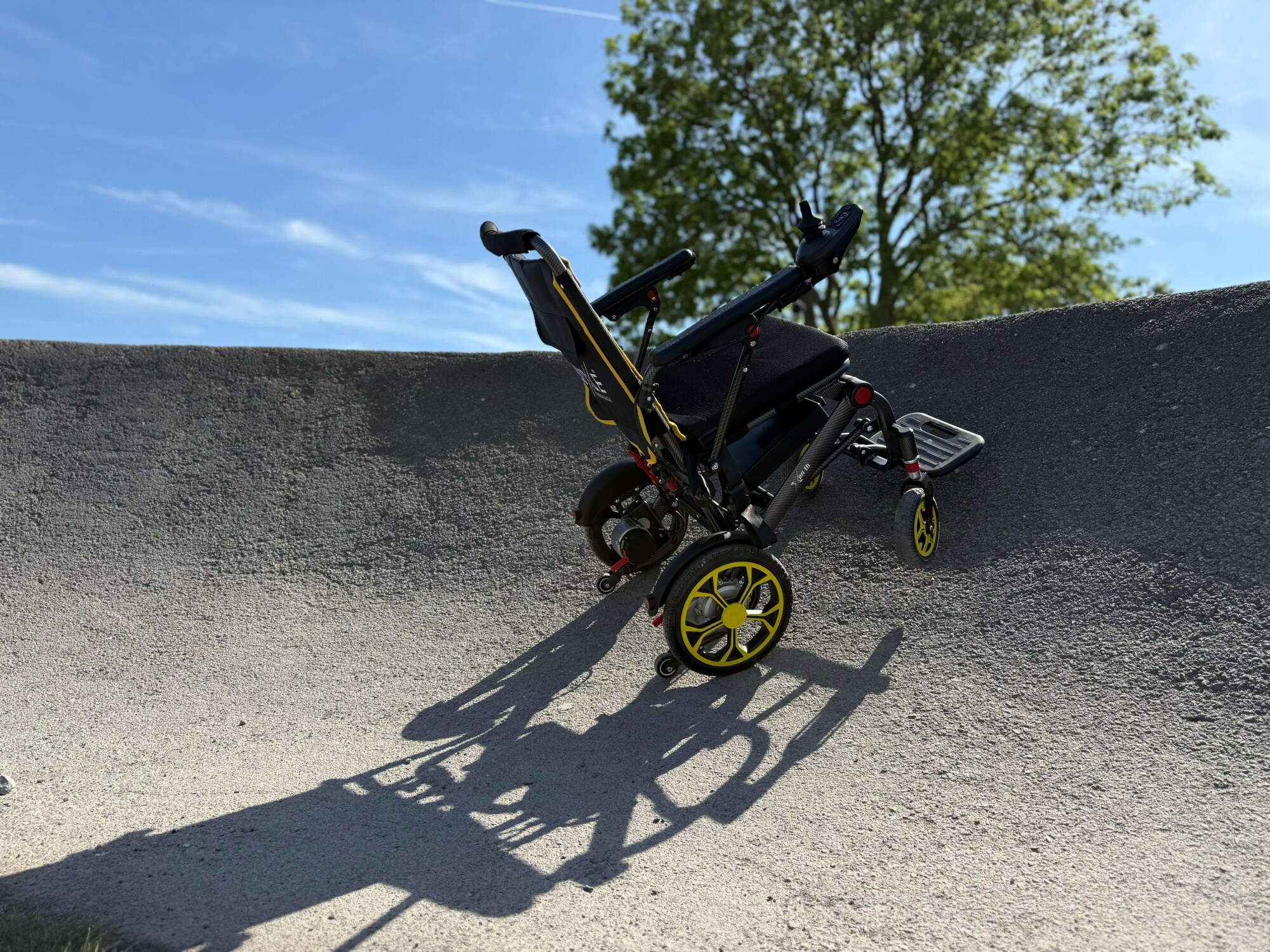 LuXe Mobility Xenith with anti-tip wheels in use - blog body image